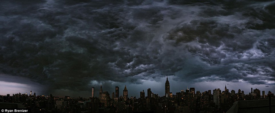 Gloomy: This dramatic image taken by photographer Ryan Brenizer shows the storm