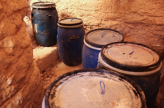 Proof: The barrels containing explosives are placed on the steps inside the Temple of Bel in Palmyra, Syria