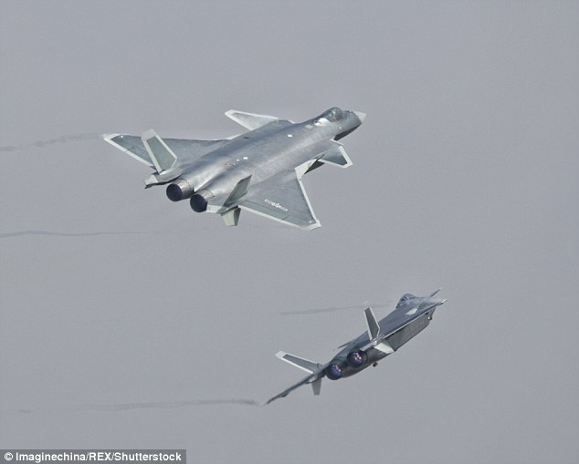 Two of the J-20 jets flew over dignitaries, industry executives and spectators and gathered at the show