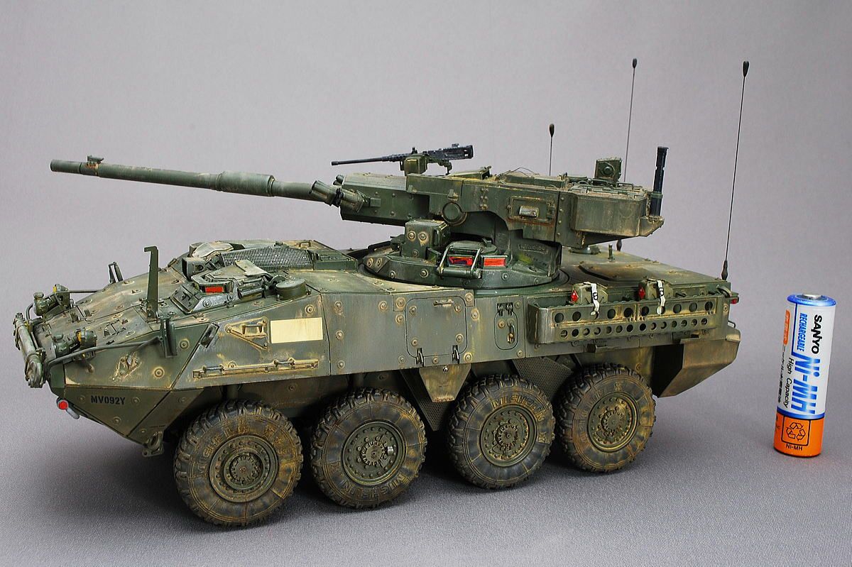 Страйкер. M1128 Stryker. Stryker Боевая бронированная машина. Боевая машина Stryker MGS m1128. Страйкер 105 мм.