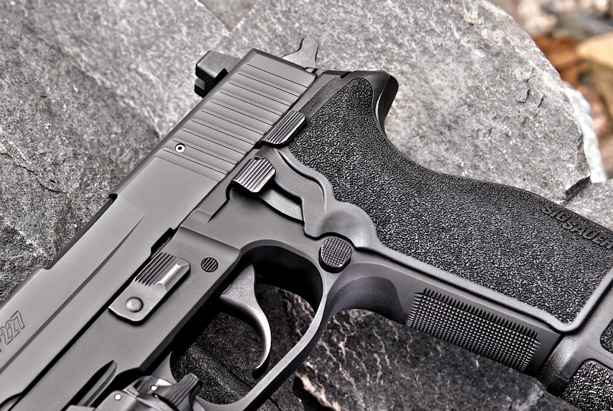 Sig sauer. Зиг Зауэр p227. Пистолет sig-Sauer p227. П 227 зиг Зауэр. Sig Sauer p226 Tactical.